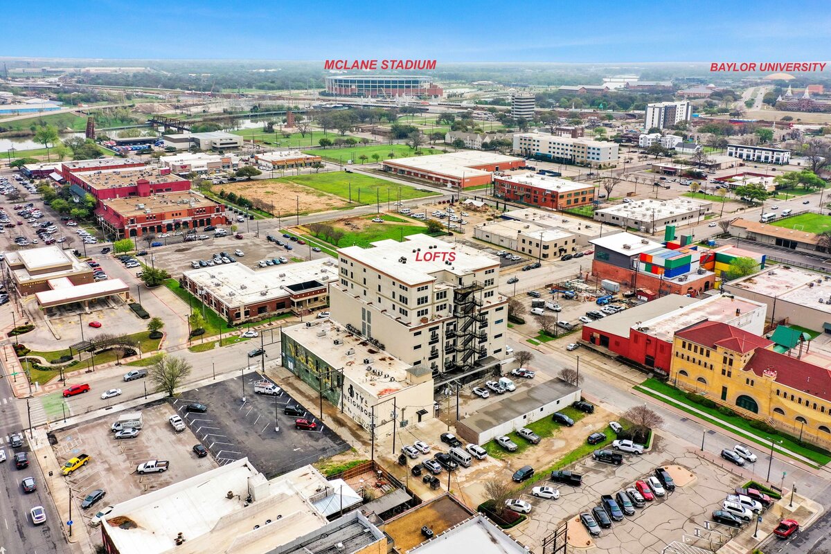 Aerial view of the local neighborhood of this one-bedroom, one-bathroom vintage industrial condo with Smart TV, free Wi-Fi, and washer/dryer located in downtown Waco, TX.