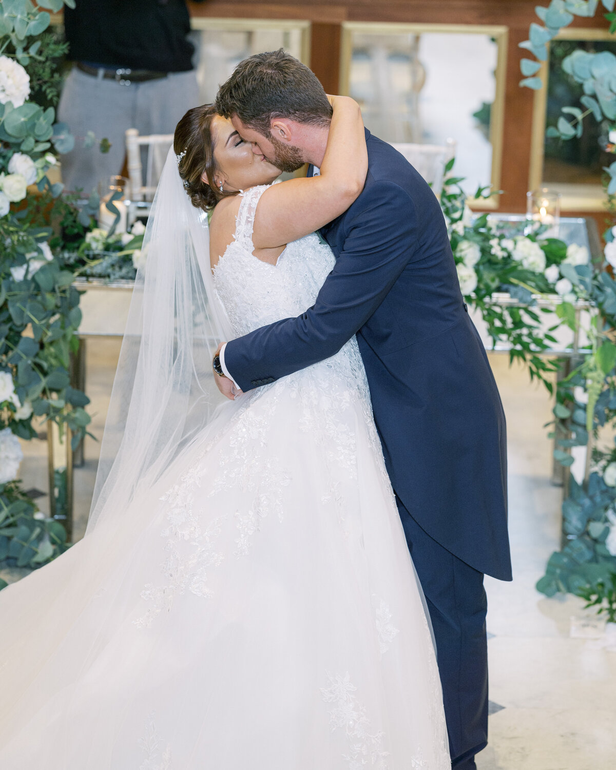 First kiss in chapel wedding ceremony