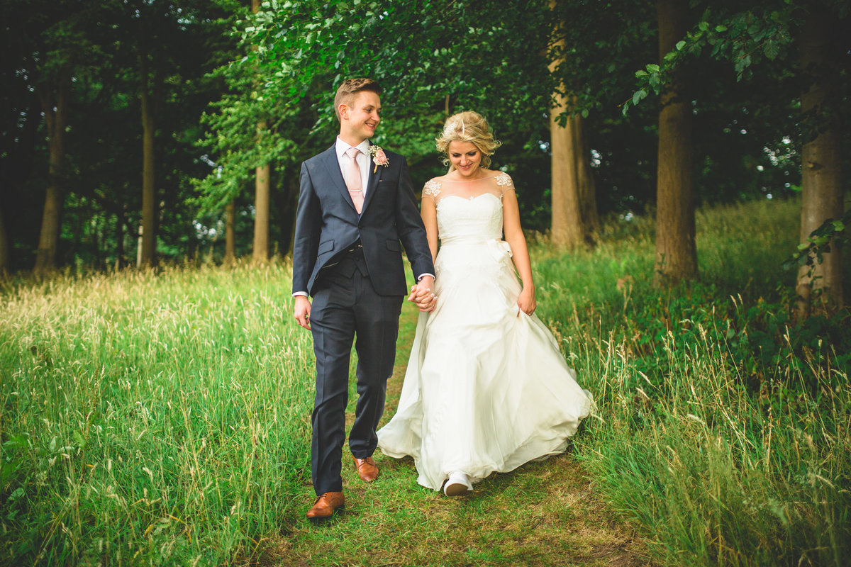 relaxed wedding photo walking combermere abbey