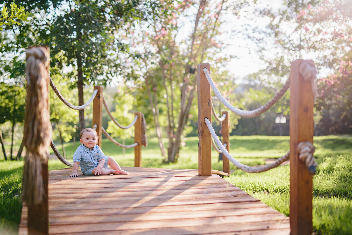 portrait of baby crawling on a bridge by San Antonio photographer Expose The Heart