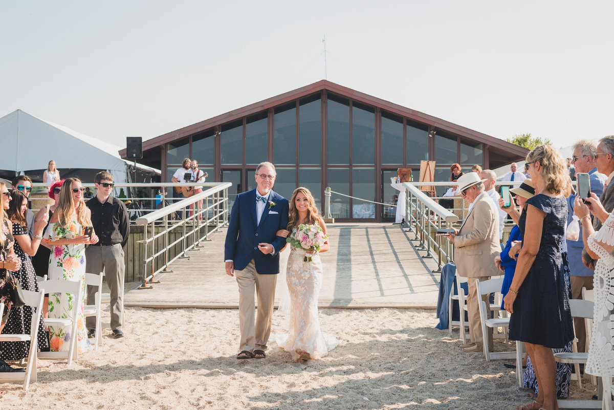 photo of dad walking bride down the aisle at beach ceremony wedding at Pavilion at Sunken Meadow