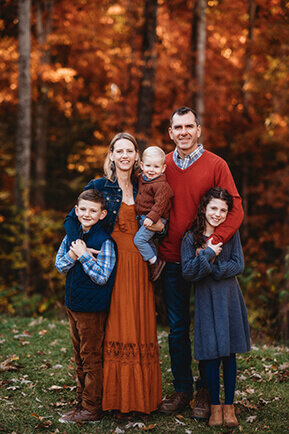 Family poses for photos during Family Portrait Session at Biltmore Estate in Asheville, NC.