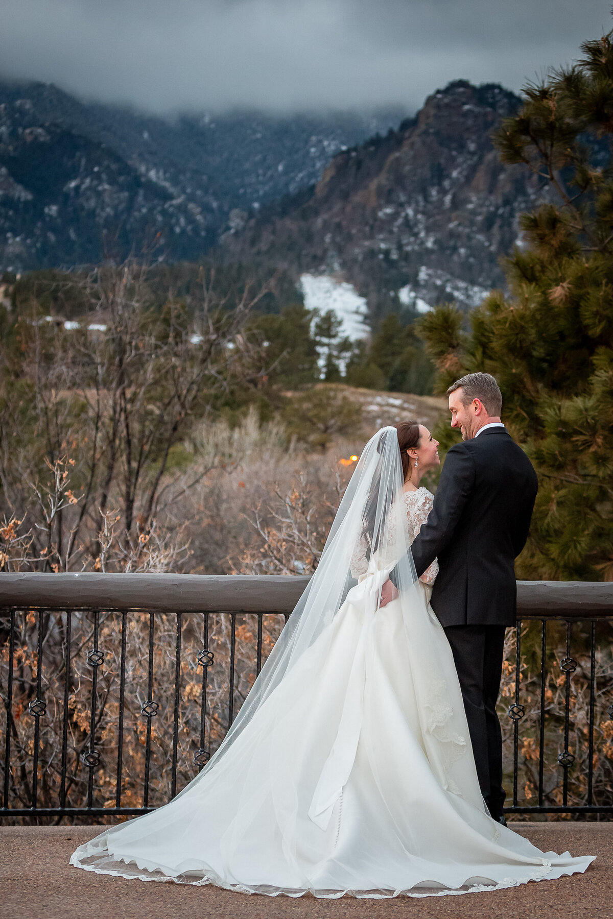Bride and Groom Look at Each Other at the Cheyenne Mountain Lodge