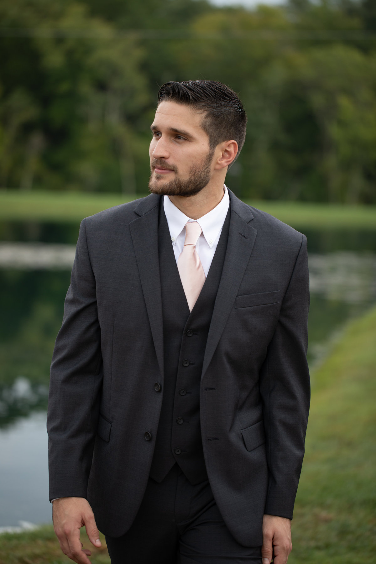 Portrait of groom at The Barn at Sycamore Farms.