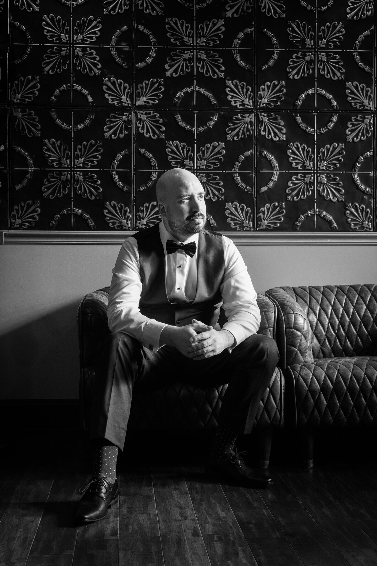 groom-black-and-white-candid-sitting-nj-marlboro