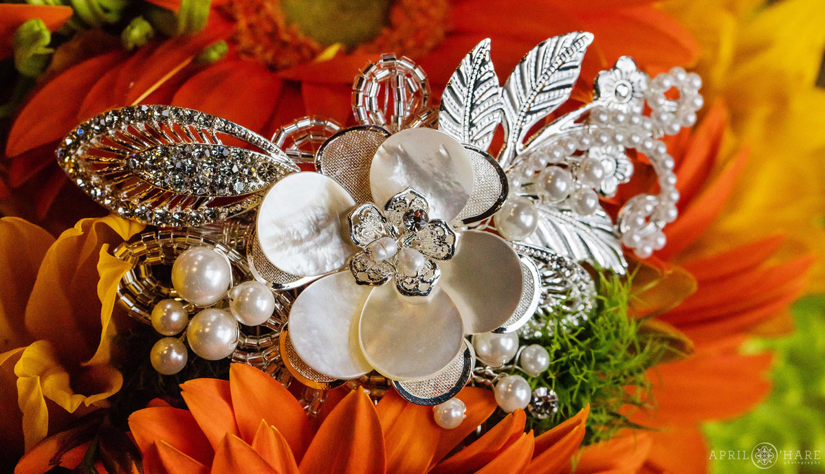 Pretty fall wedding detail flowers with jeweled hair piece in Colorado