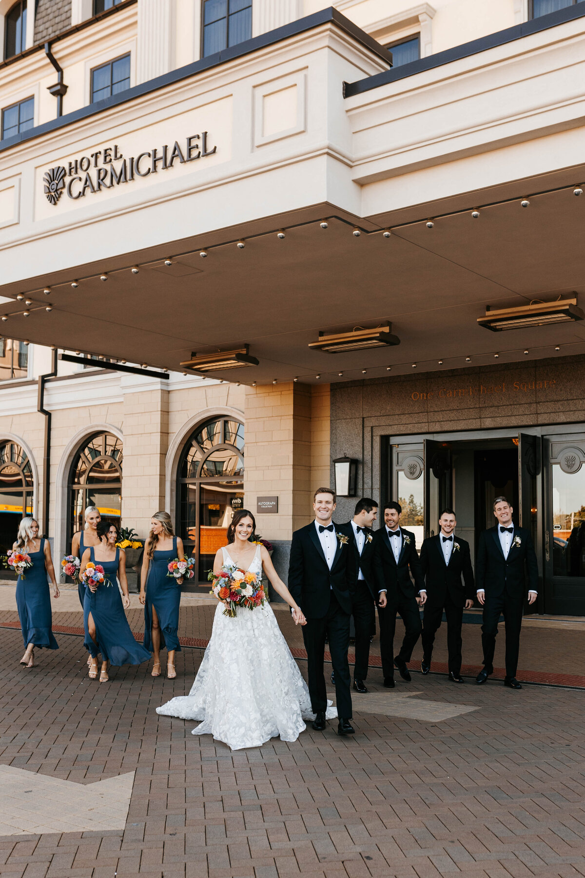 Bridal party outside of hotel
