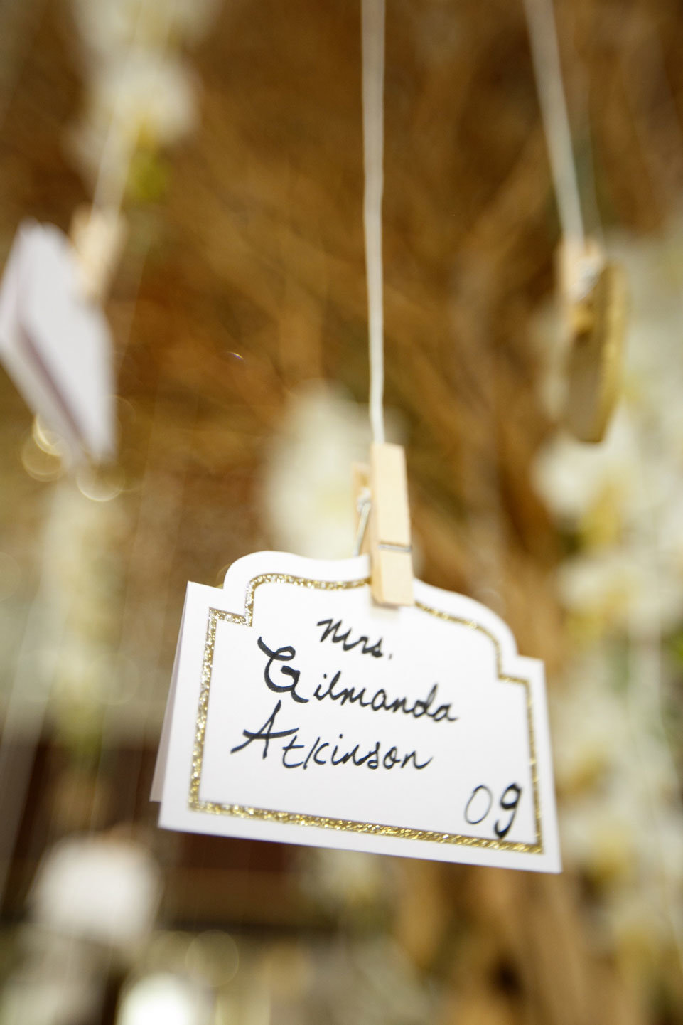 Wedding place card hanging from a tree