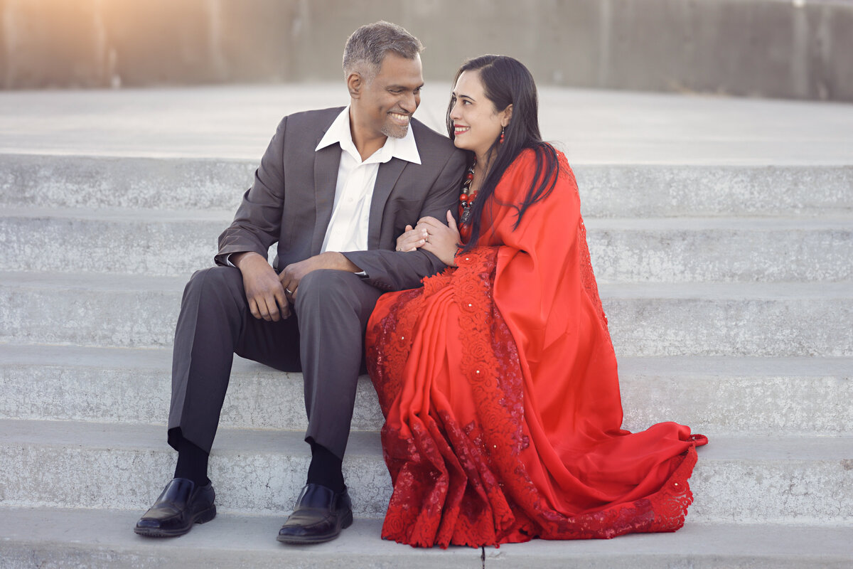 Family-Photos-photography-photographer-yvonne-min-mom-dad-engagement-stairs-outside-natural-light-golden-hour-sunset-boulder-thornton-denver-north-colorado-arvada-northglenn-westminster-broomfield-rail-station-images-canon-couple-portrait-India-red-76