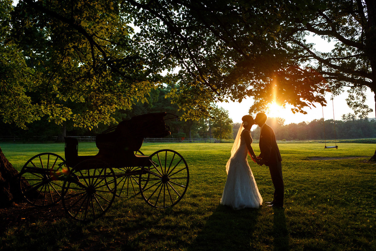 Sunset at Mayowood Stone Barn with a horse and buggy