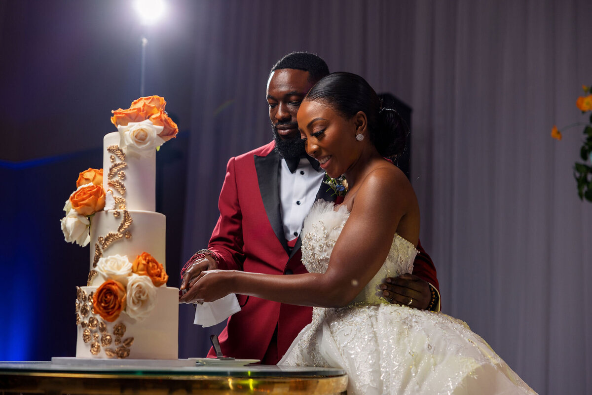 Tomi and Tolu Oruka Events Ziggy on the Lens photographer Wedding event planners Toronto planner African Nigerian Eyitayo Dada Dara Ayoola ottawa convention and event centre pocket flowers Navy blue groom suit ball gown black bride classy  156
