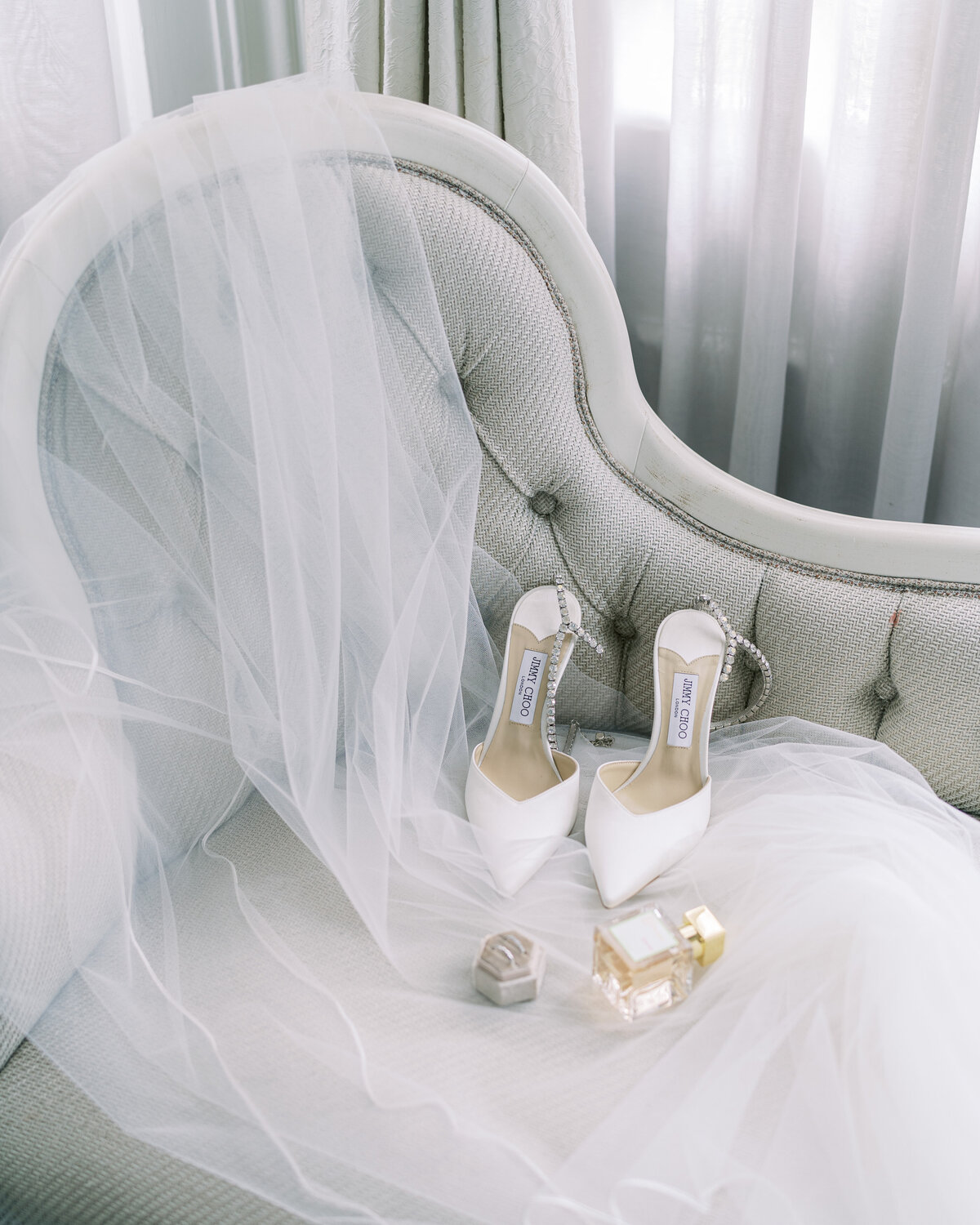 Jimmy Choo wedding shoes, veil and perfume at Hedsor House