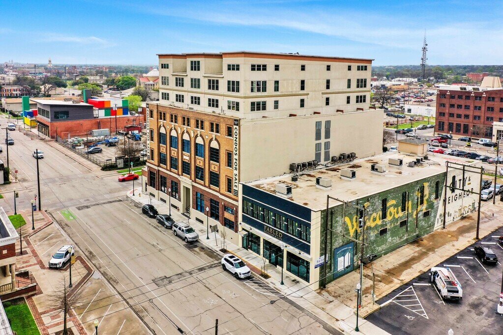 Exterior view of Behrens Lofts and Fabled Bookshop, which holds this 2 bedroom, 2.5 bathroom luxury vacation rental loft condo for 8 guests with incredible downtown views, free parking, free wifi and professional decor in downtown Waco, TX.