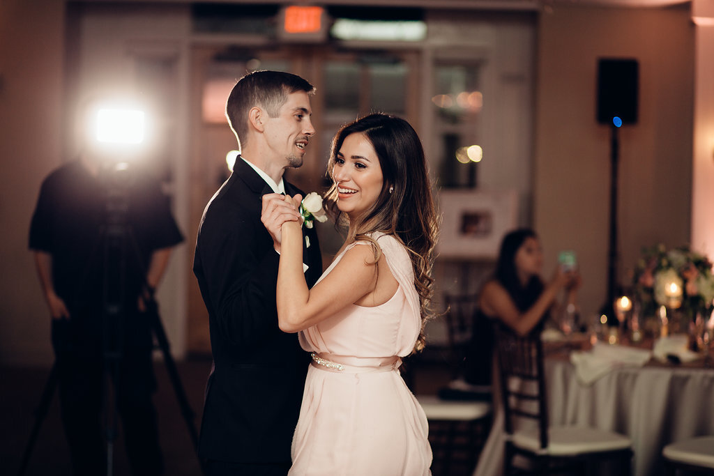 Wedding Photograph Of Groom Dancing With A Woman In Peach Dress Los Angeles