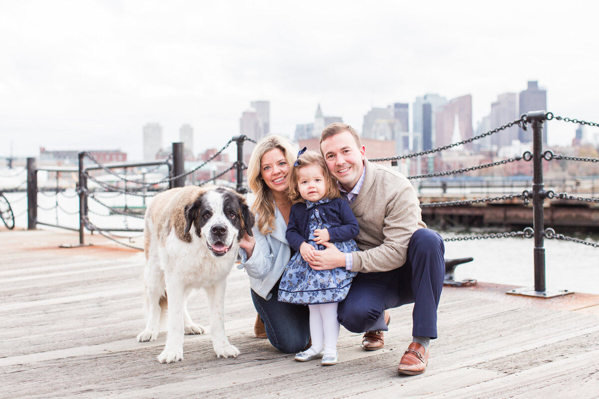 parents with daughter and dog in the Charlestown Navy Yard