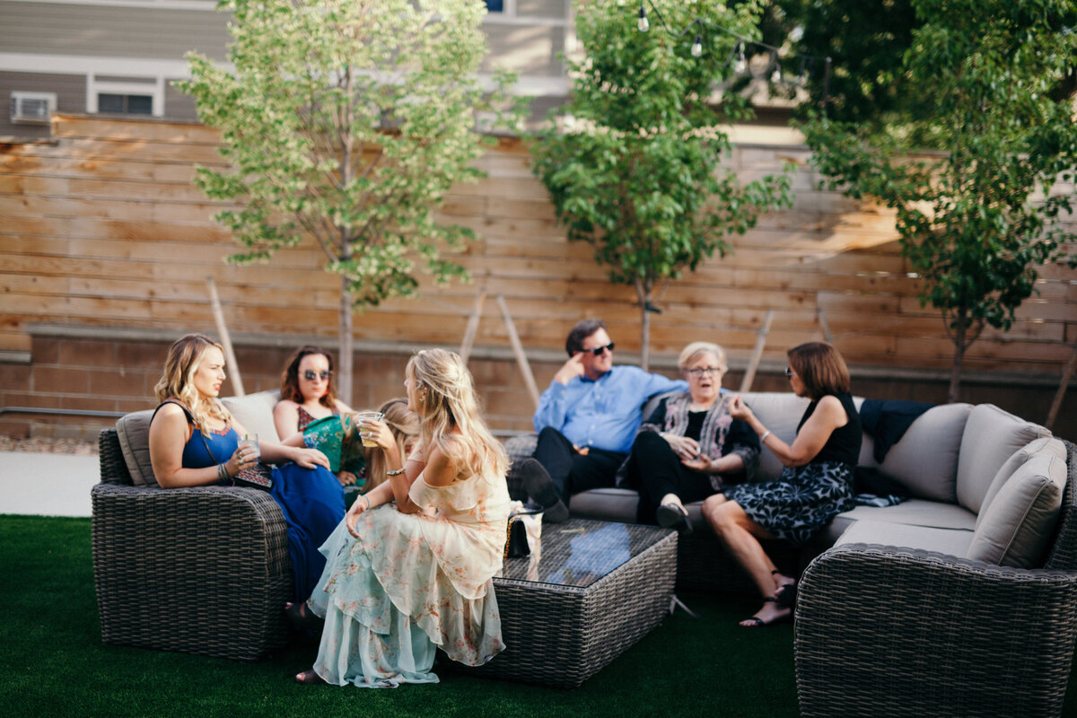 wedding guests relaxing at outside wedding in Longmont Colorado