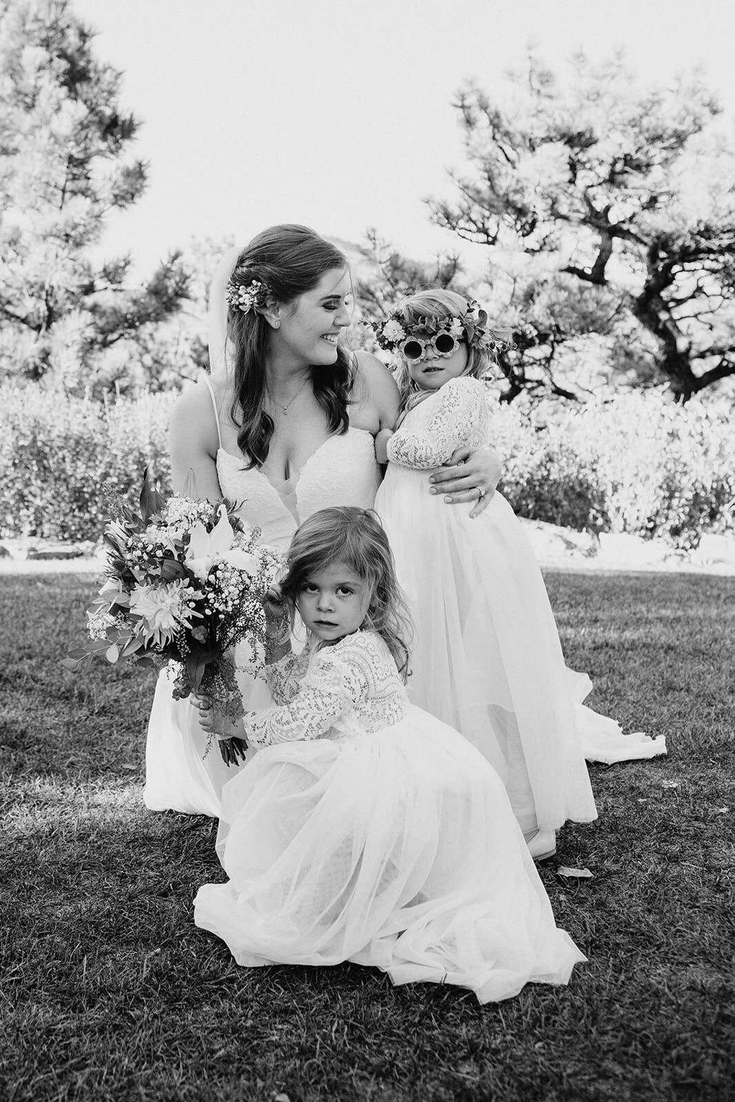 candid photo with flower girls at denver colorado wedding