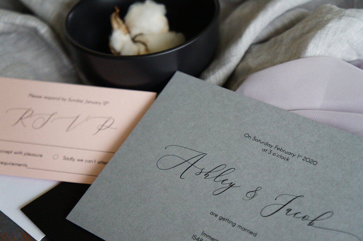Pink and grey elegant wedding invitation with script cursive font