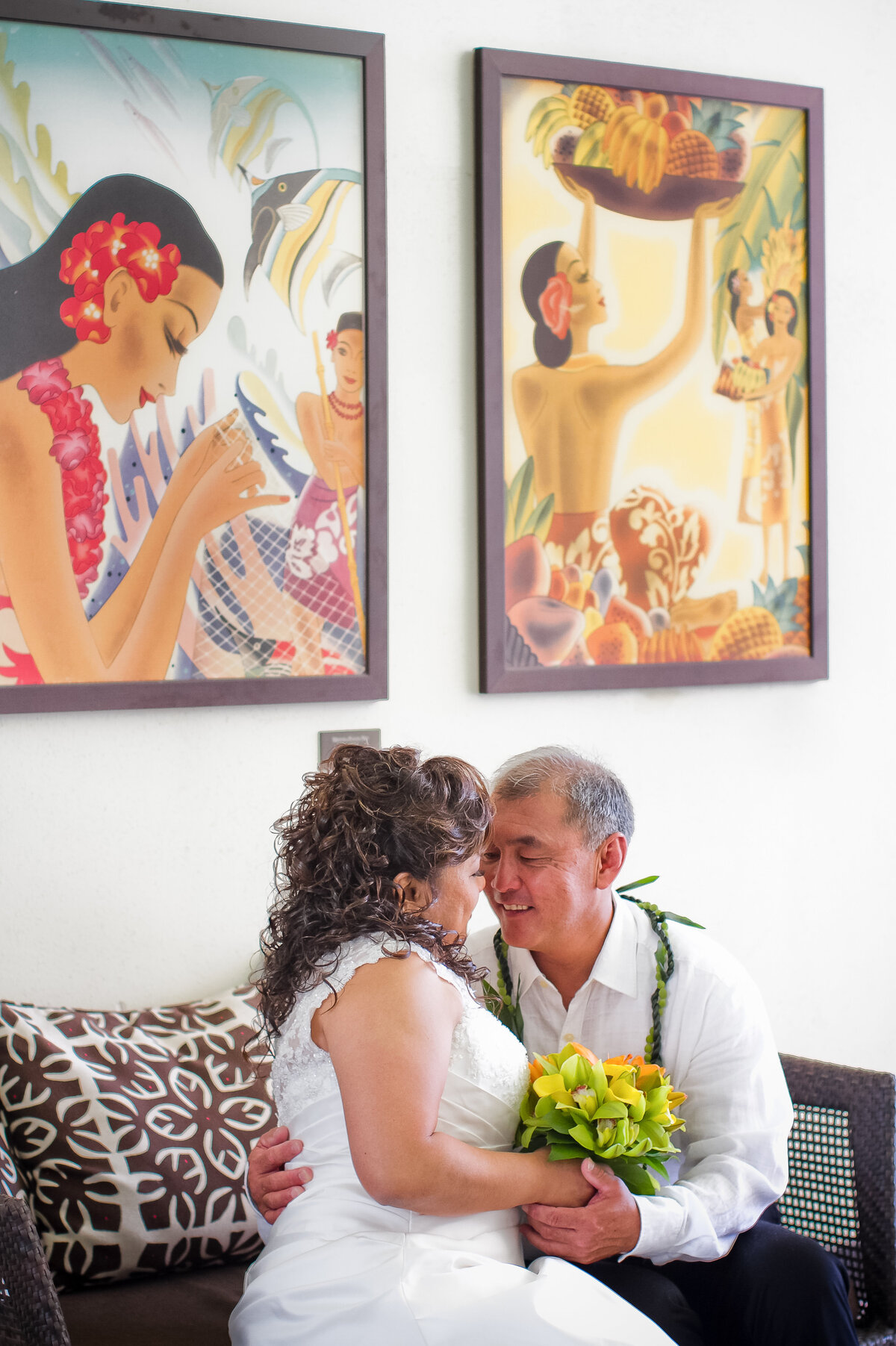 Bride and Groom Cuddle at the Royal Hawaiian Hotel