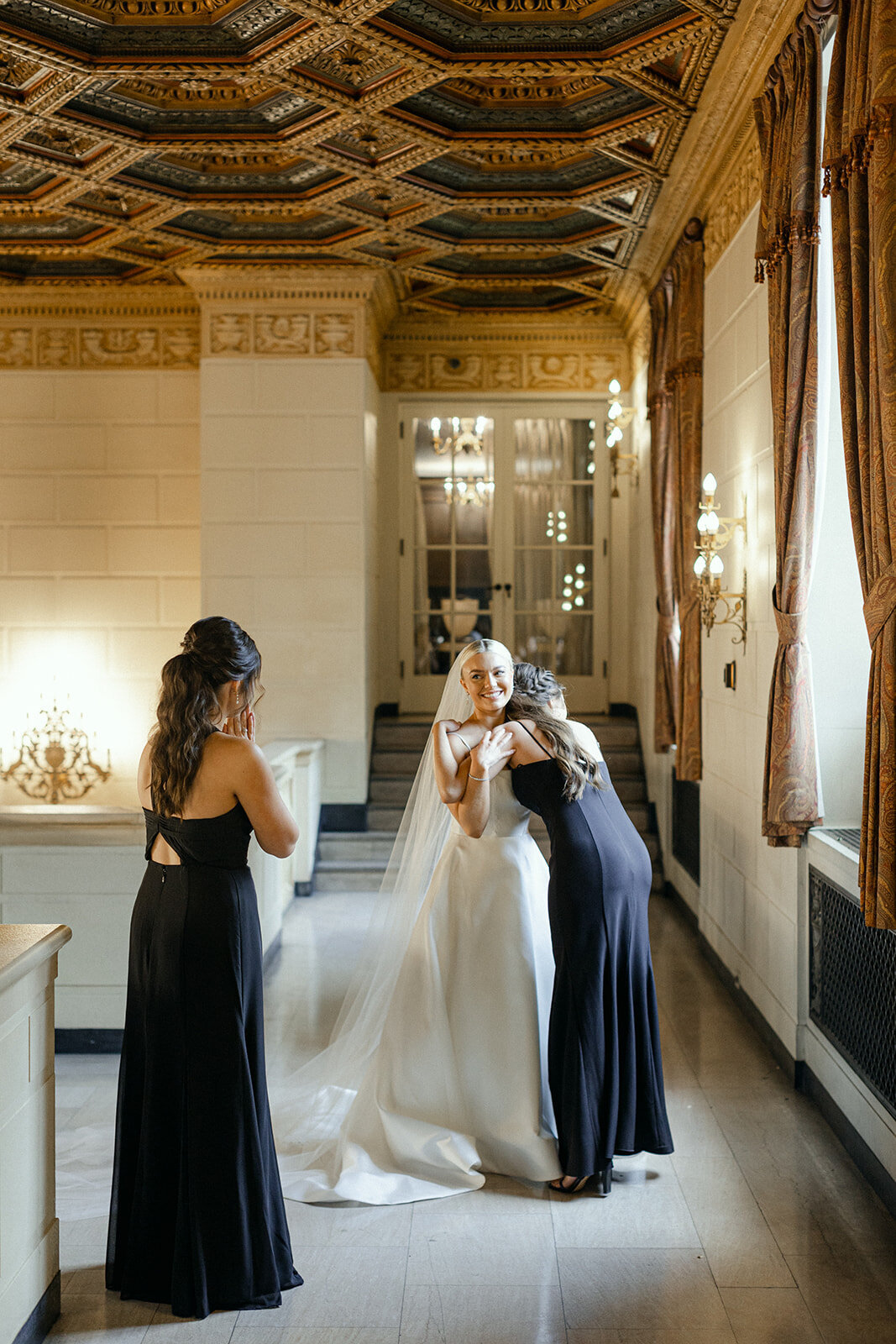 Bride and groom celebrating at the Omni William Penn Hotel wedding in Pittsburgh