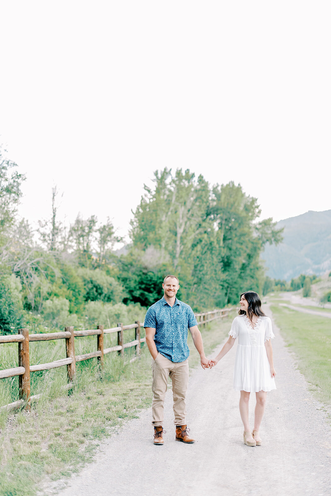 Couple walking at Sun Valley Resort Engagement Session with the Best Sun Valley Wedding Photographers