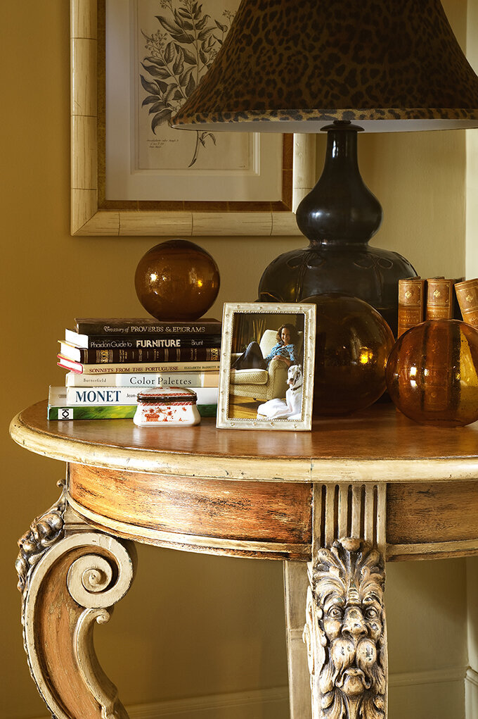 Panageries Residential Interior Design | Tudor Revival Estate Bed Side Table with Books, Décor, and a picture frame