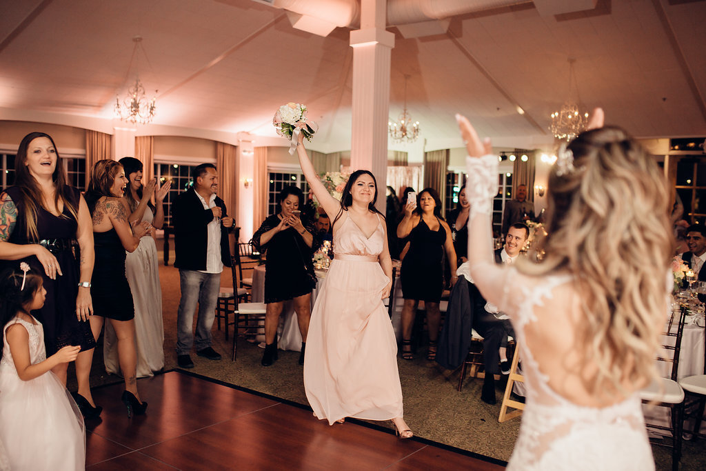 Wedding Photograph Of Visitors Clapping To The Woman Who Caught The Bouquet Los Angeles