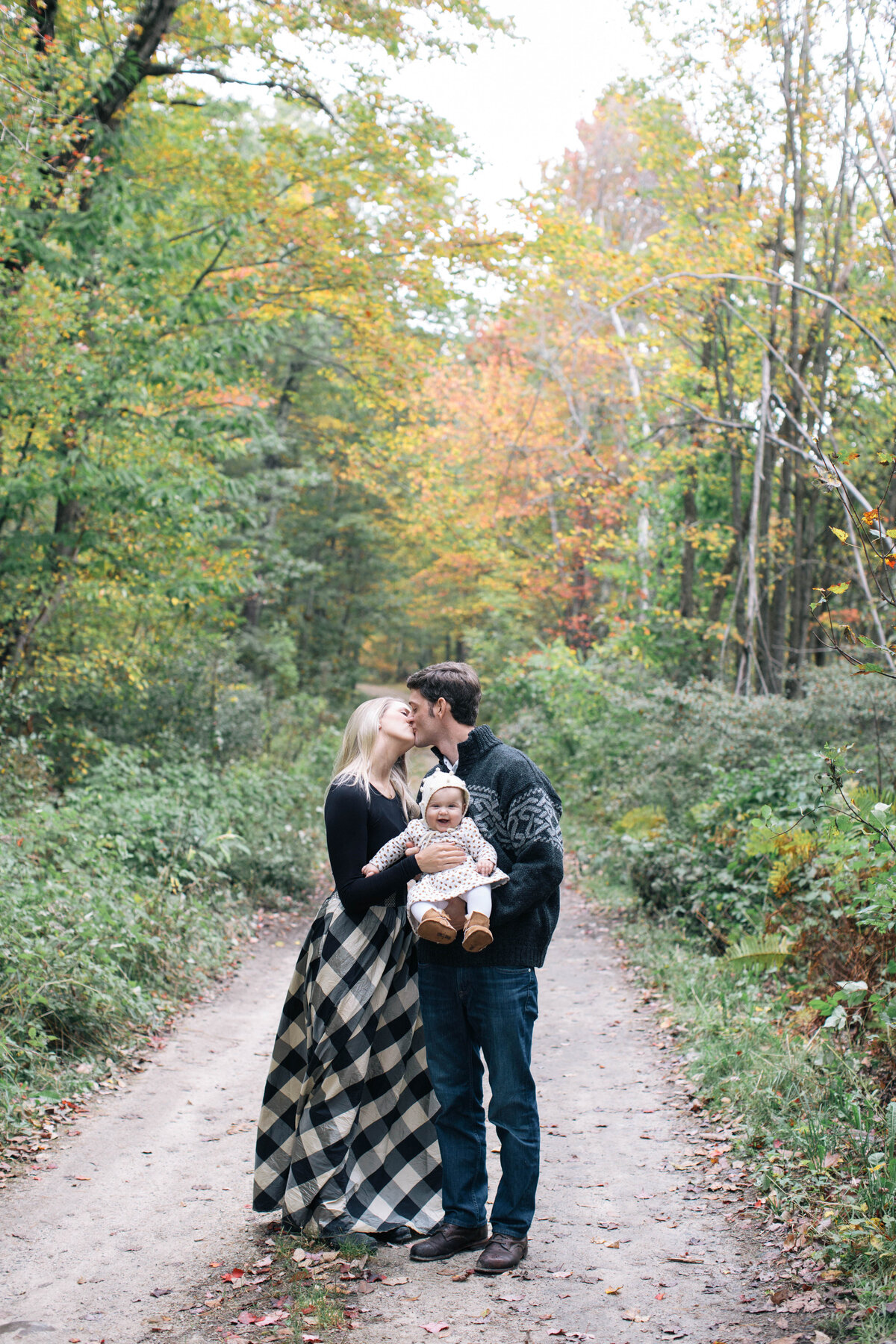 couple with baby at new hampshire family photoshoot