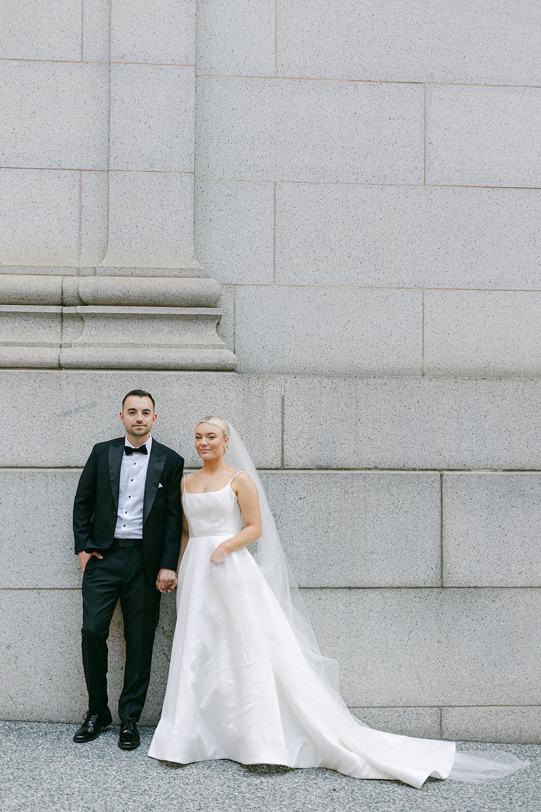 Bride and groom celebrating at the Omni William Penn Hotel wedding in Pittsburgh