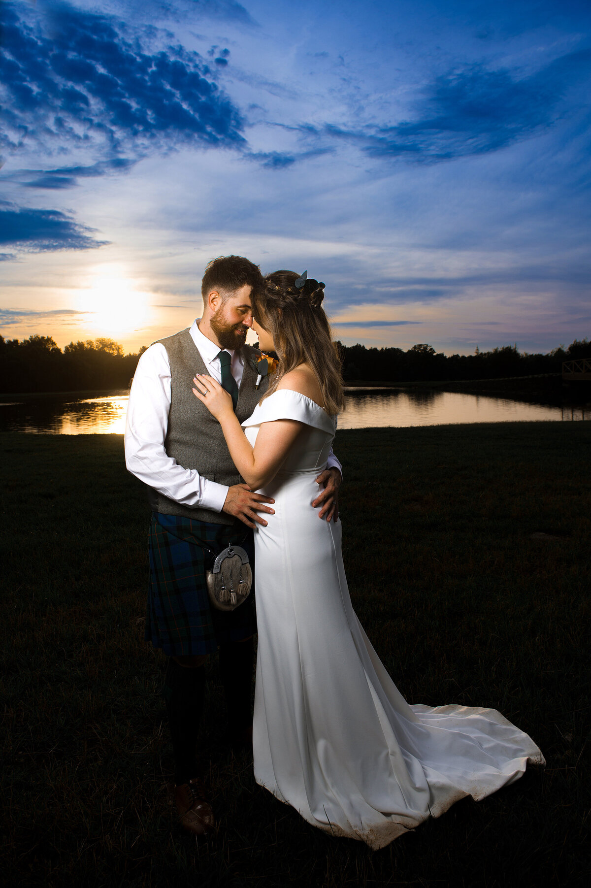 Elopement at pond at sunset
