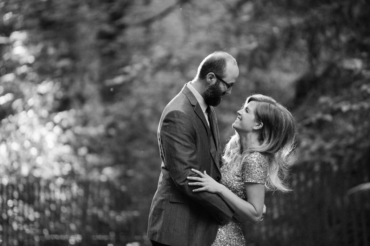 Romantic moody black and white engagement photo in Woods near Woodinville WA candid photo by Joanna Monger Photography