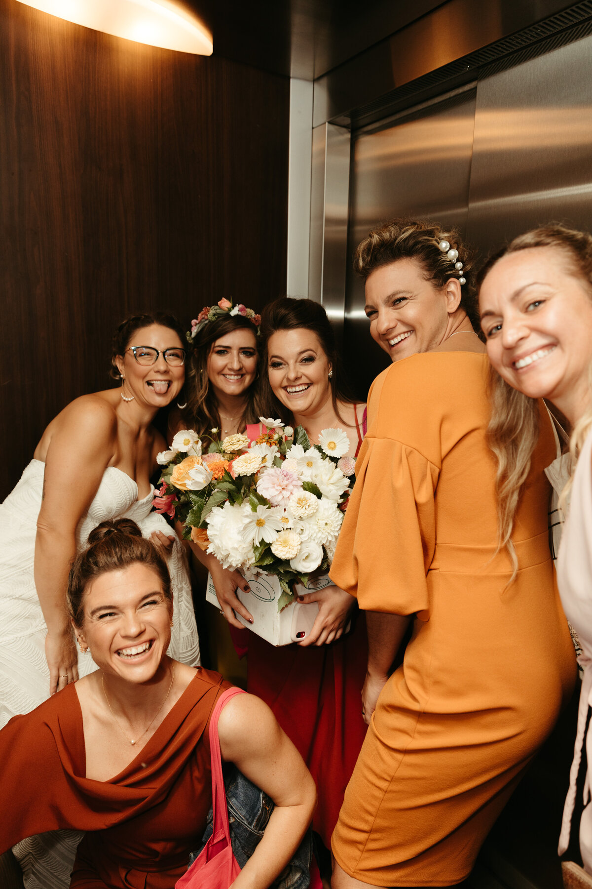 wedding party in an elevator
