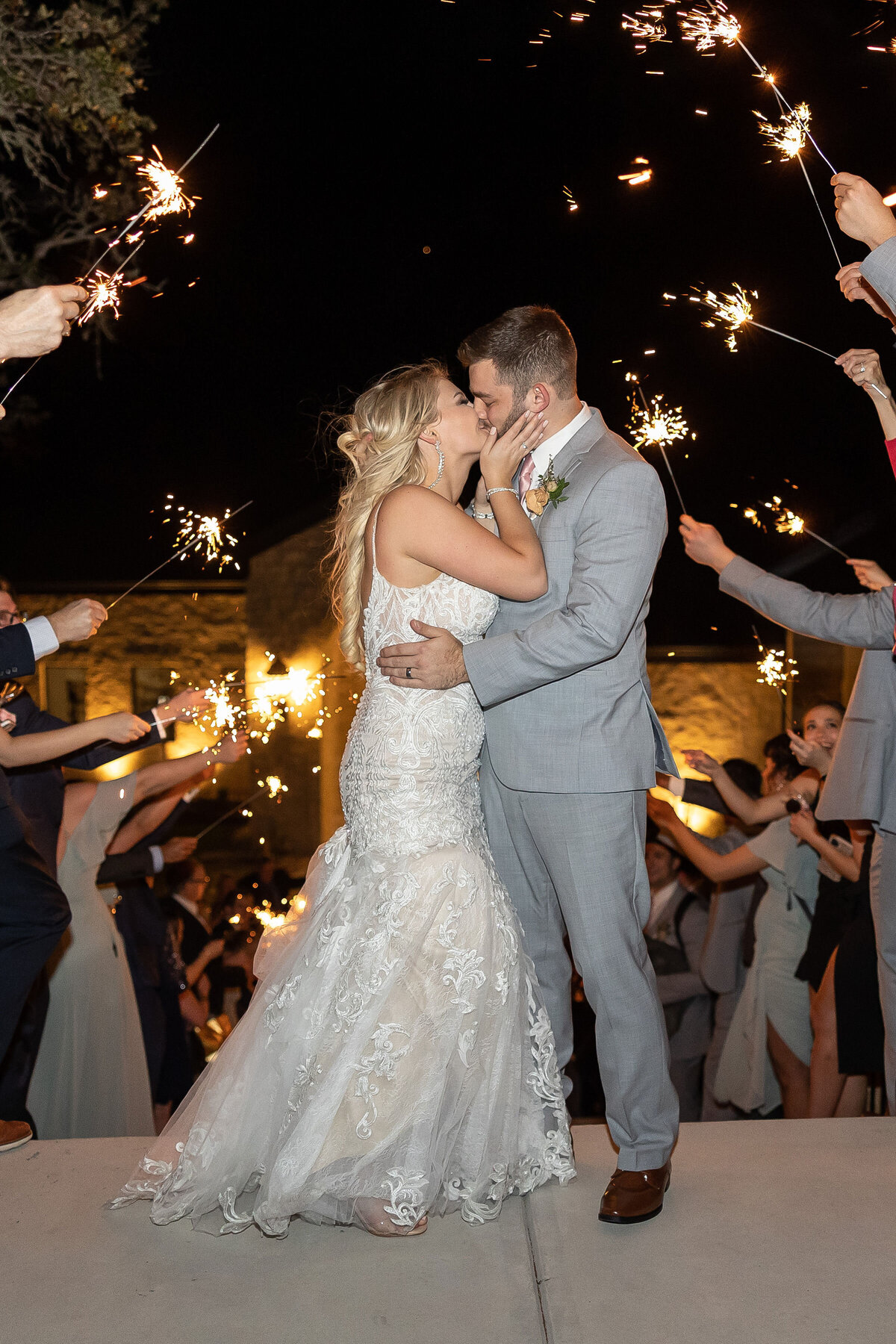 bride and groom kiss at sparkler exit at The Preserve at Canyon Lake