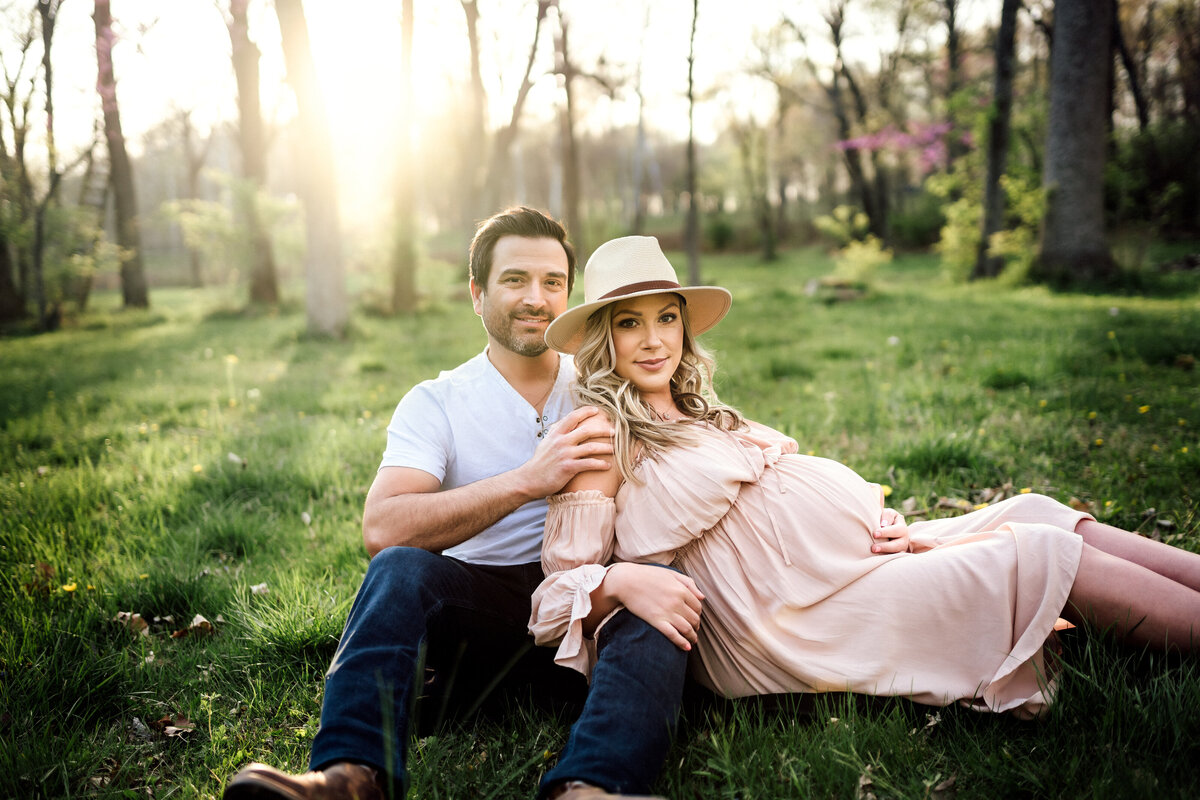 Couple sitting in grass