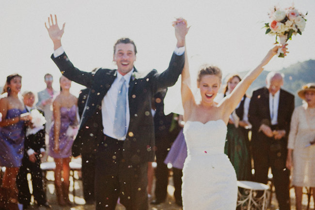 hands in the air as they exit ceremony