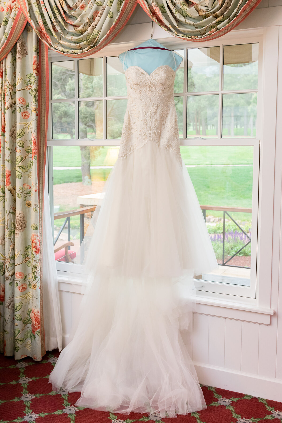 Wedding Dress Hangs in a Suite at the Broadmoor, Colorado
