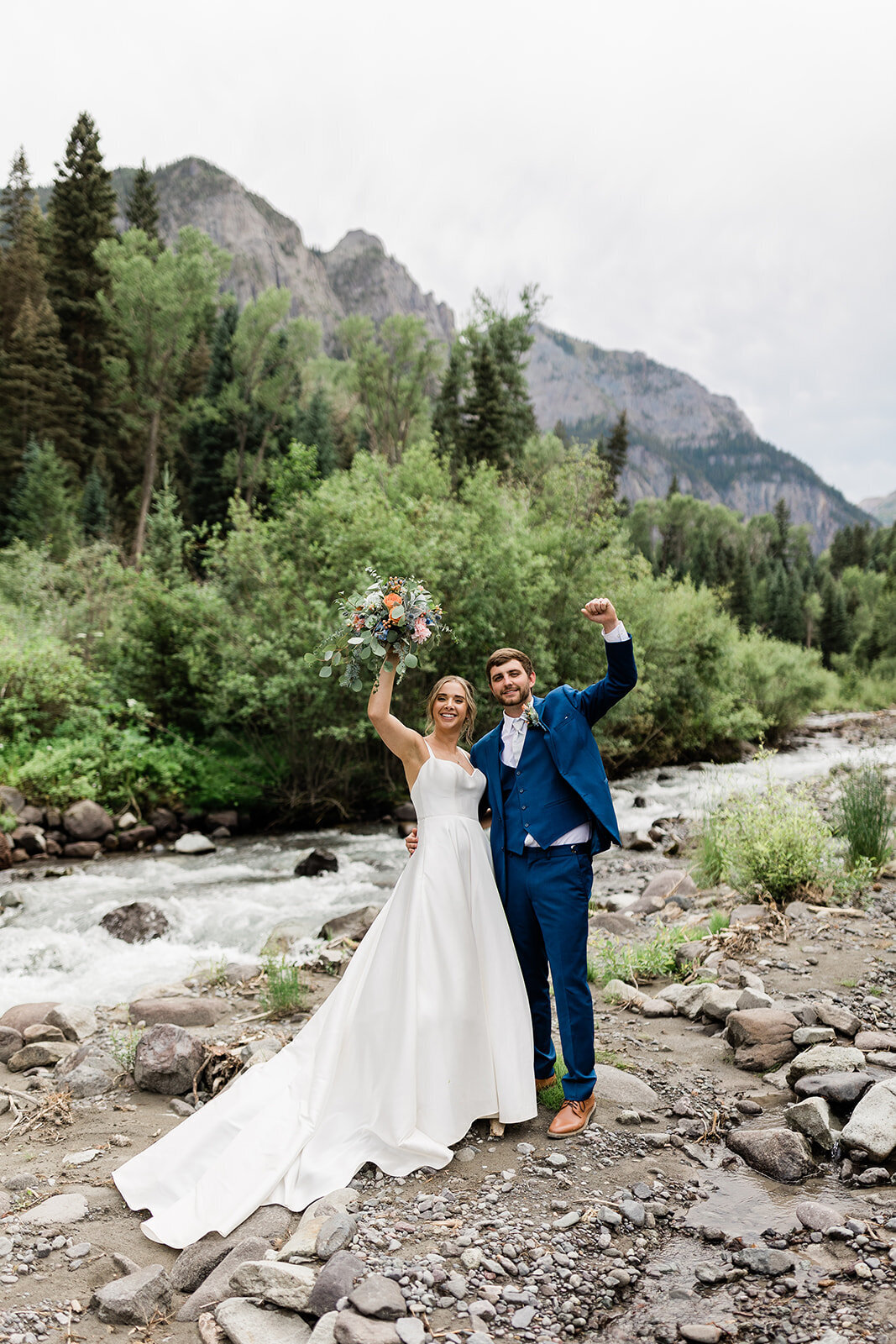 Ouray elopement couple photo in front of river