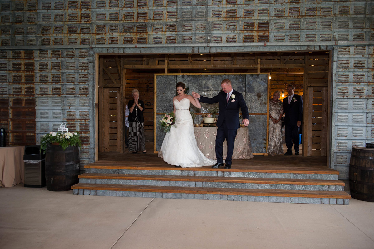 couple enter the reception space