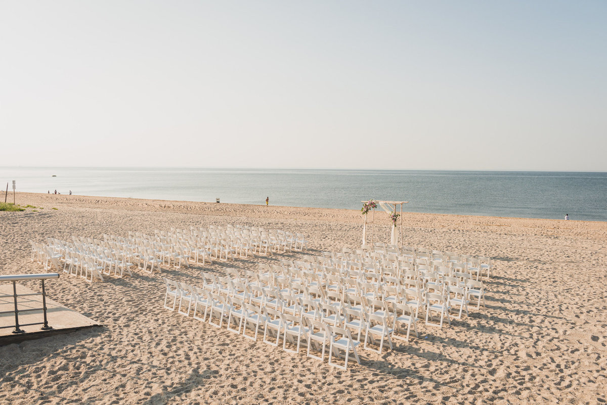 aerial photo of beach wedding ceremony set up at Pavilion at Sunken Meadow