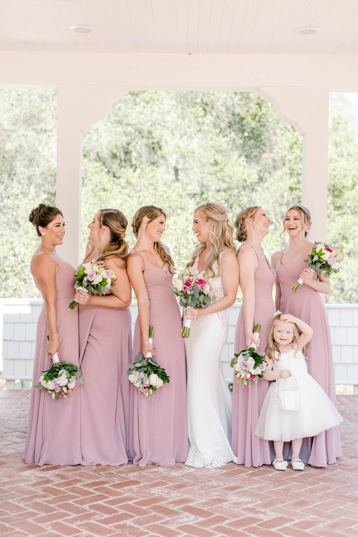 Bride with bridesmaids and flower girl