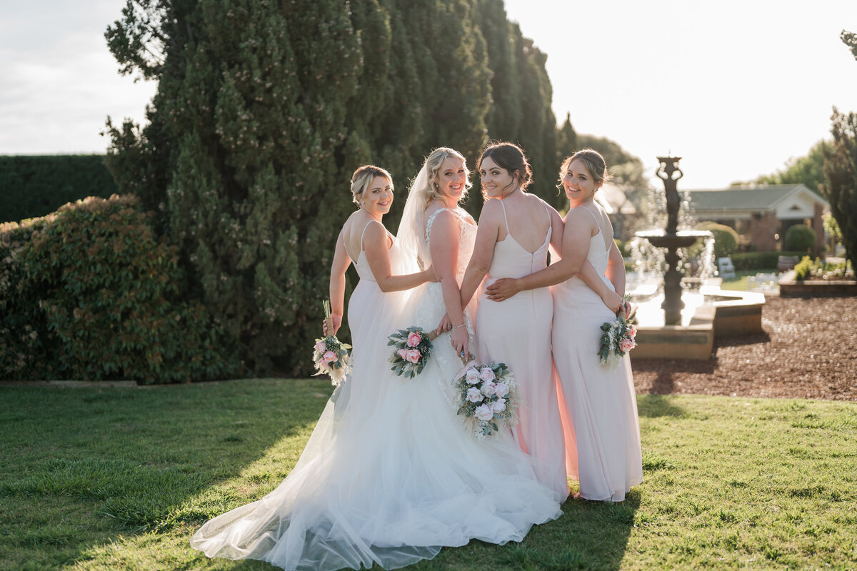 Bridesmaids in pink dresses on a wedding day
