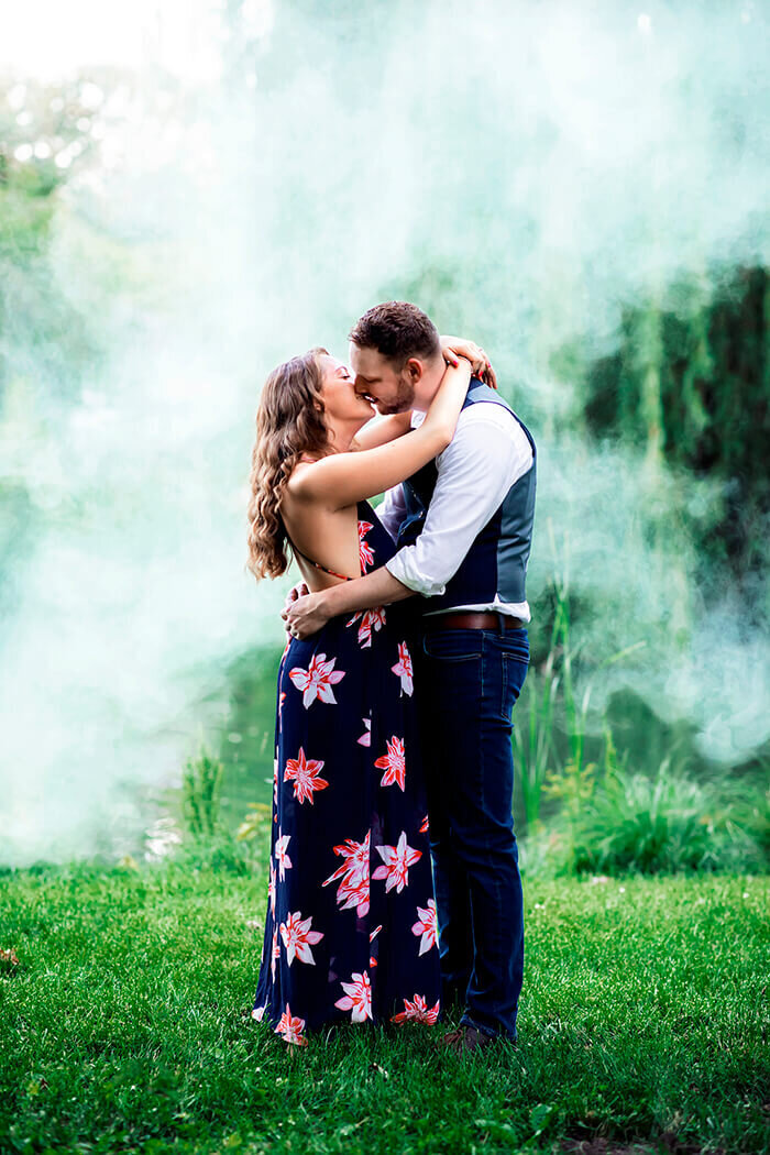 man-woman-kiss-willow-tree-green-smoke