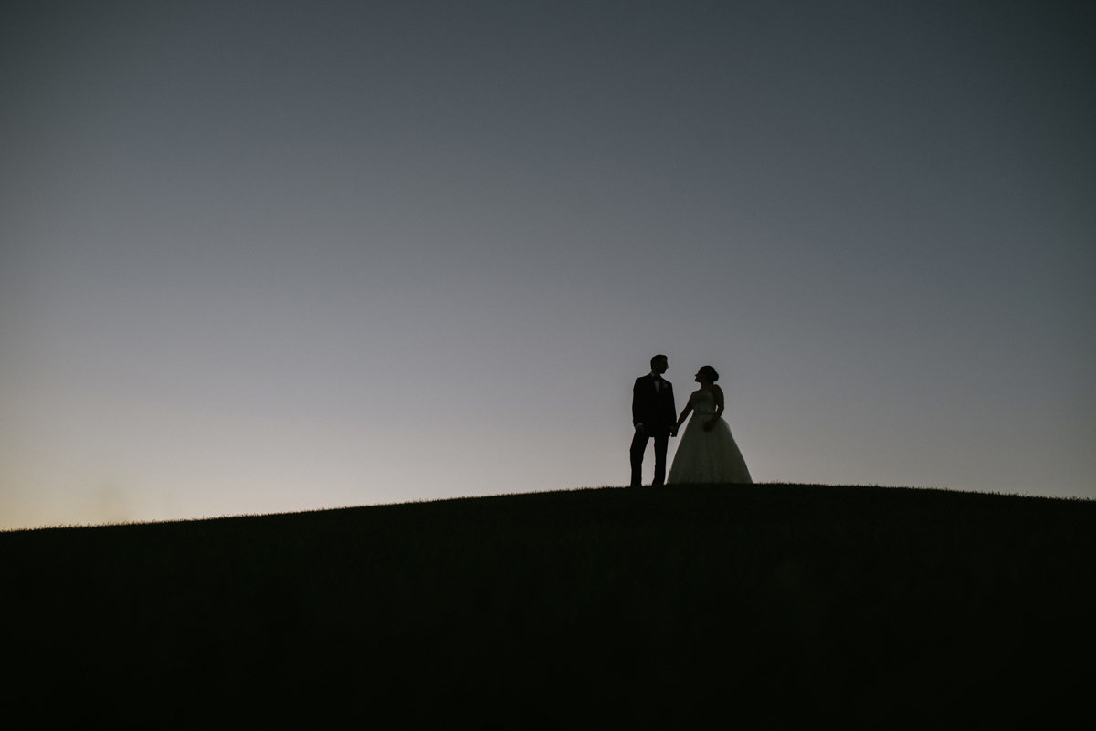 spring lake golf club wedding silhouette night shot wedding bride and groom