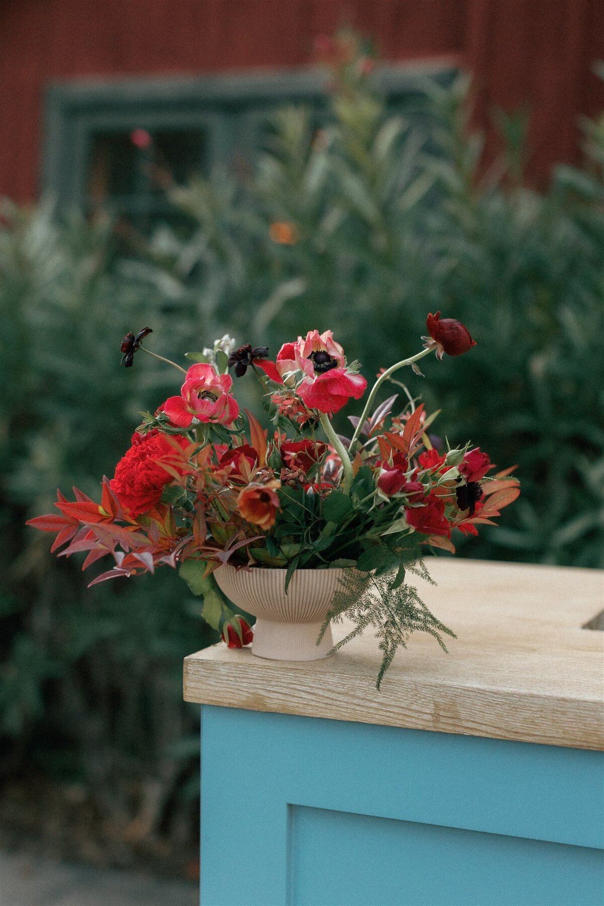 Carmel California Wedding Blue Bar Red Flowers