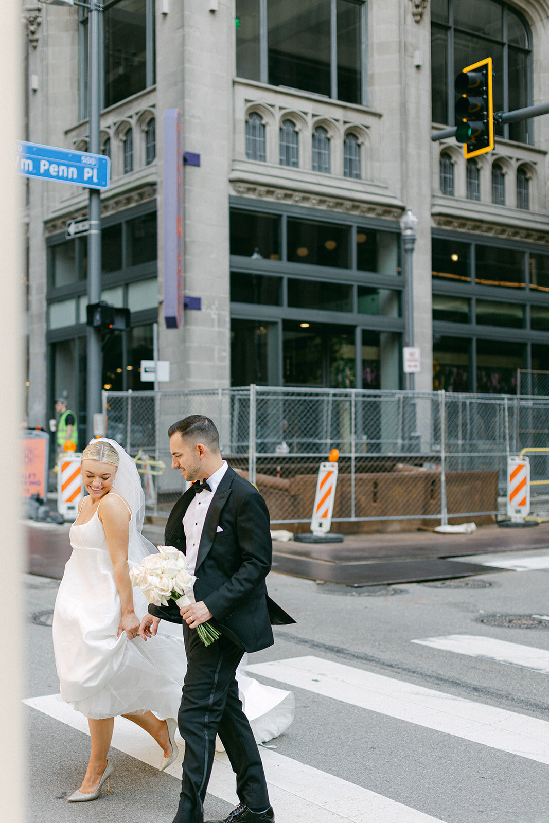 Bride and groom celebrating at the Omni William Penn Hotel wedding in Pittsburgh