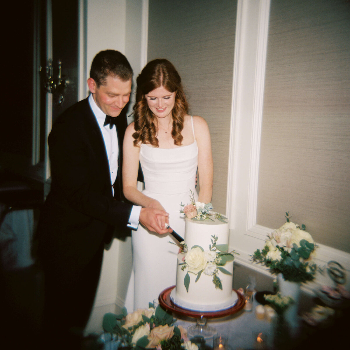Bride and groom cutting wedding cake at  Lord Nelson Hotel Wedding, in Halifax, Nova Scotia