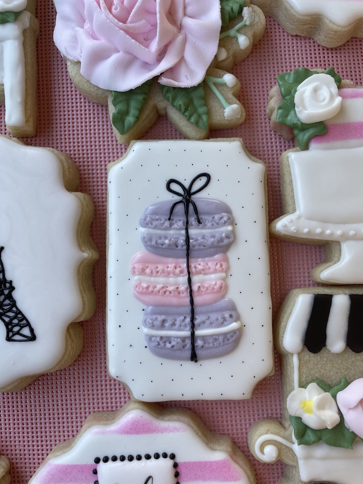 Custom-designed girly sugar cookies with intricate icing details, perfect for birthdays, made in Gilbert.