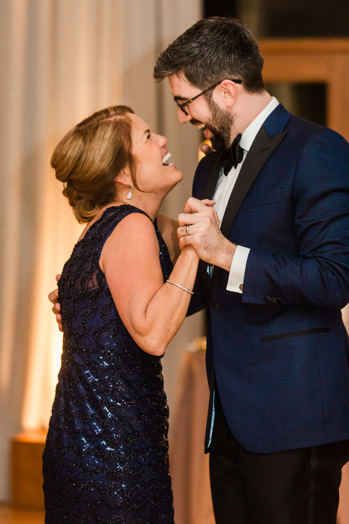 A mother shares a special dance with her son on his wedding day at the Ivy Room in Chicago