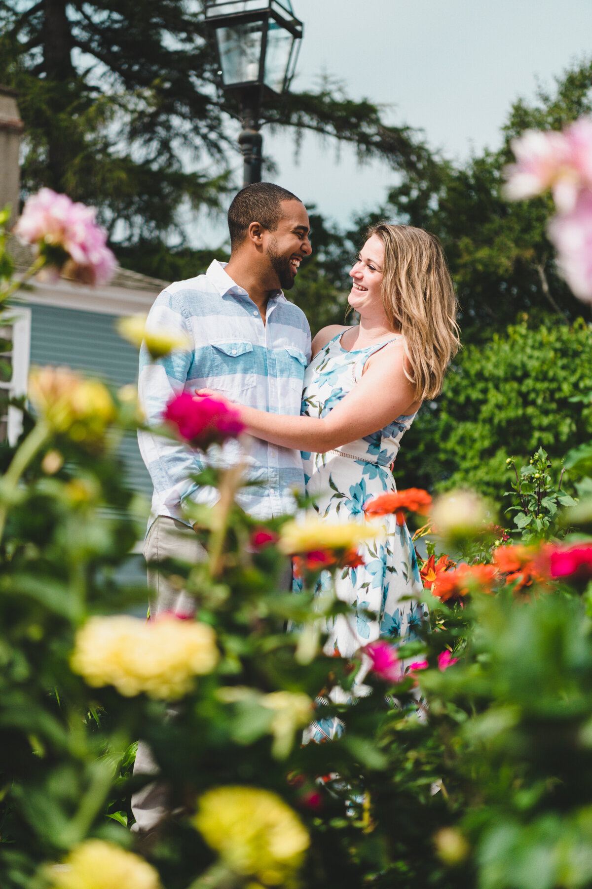 New Hampshire engagement session outdoor with flowers