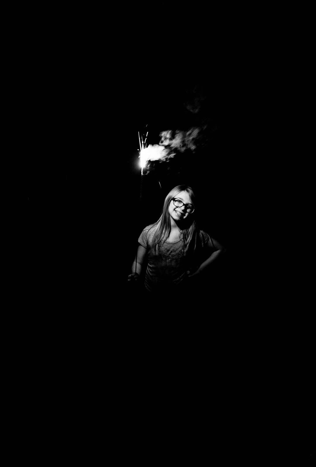 black-and-white-photograph-of-girl-holding-sparkler